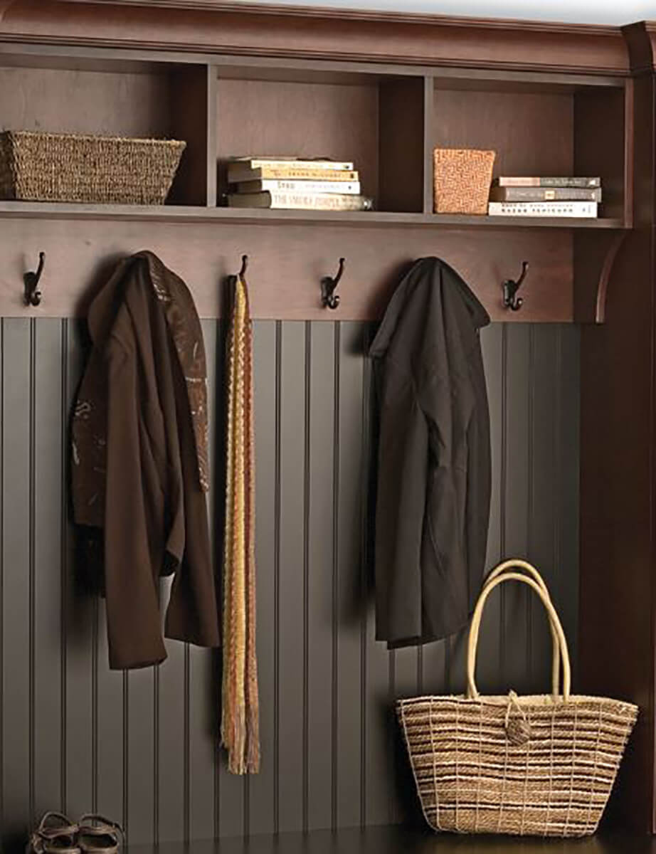 Coat hooks for a custom walk-in closet.