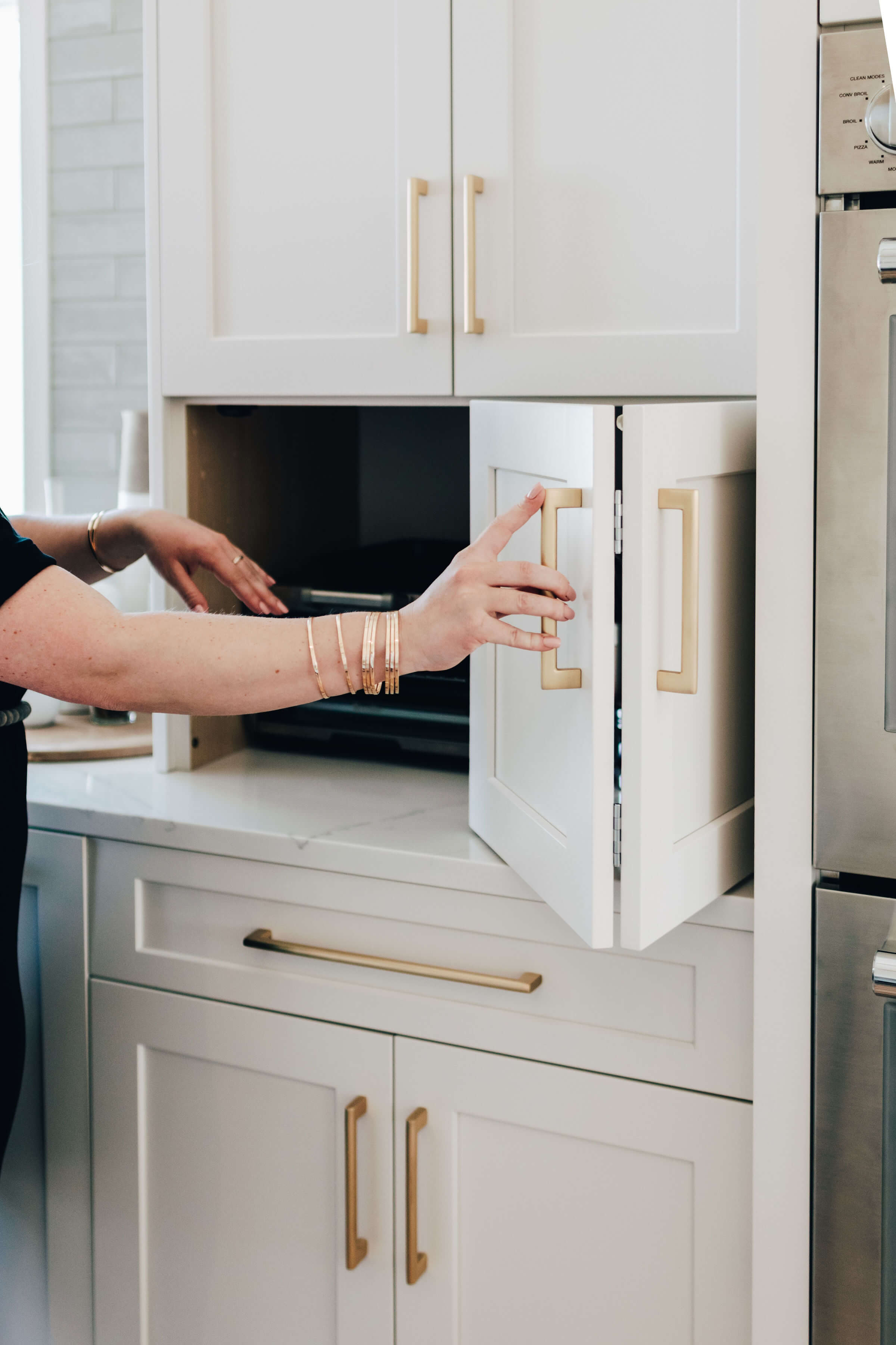 Modify cabinet from door & drawer to single door with mixer lift?