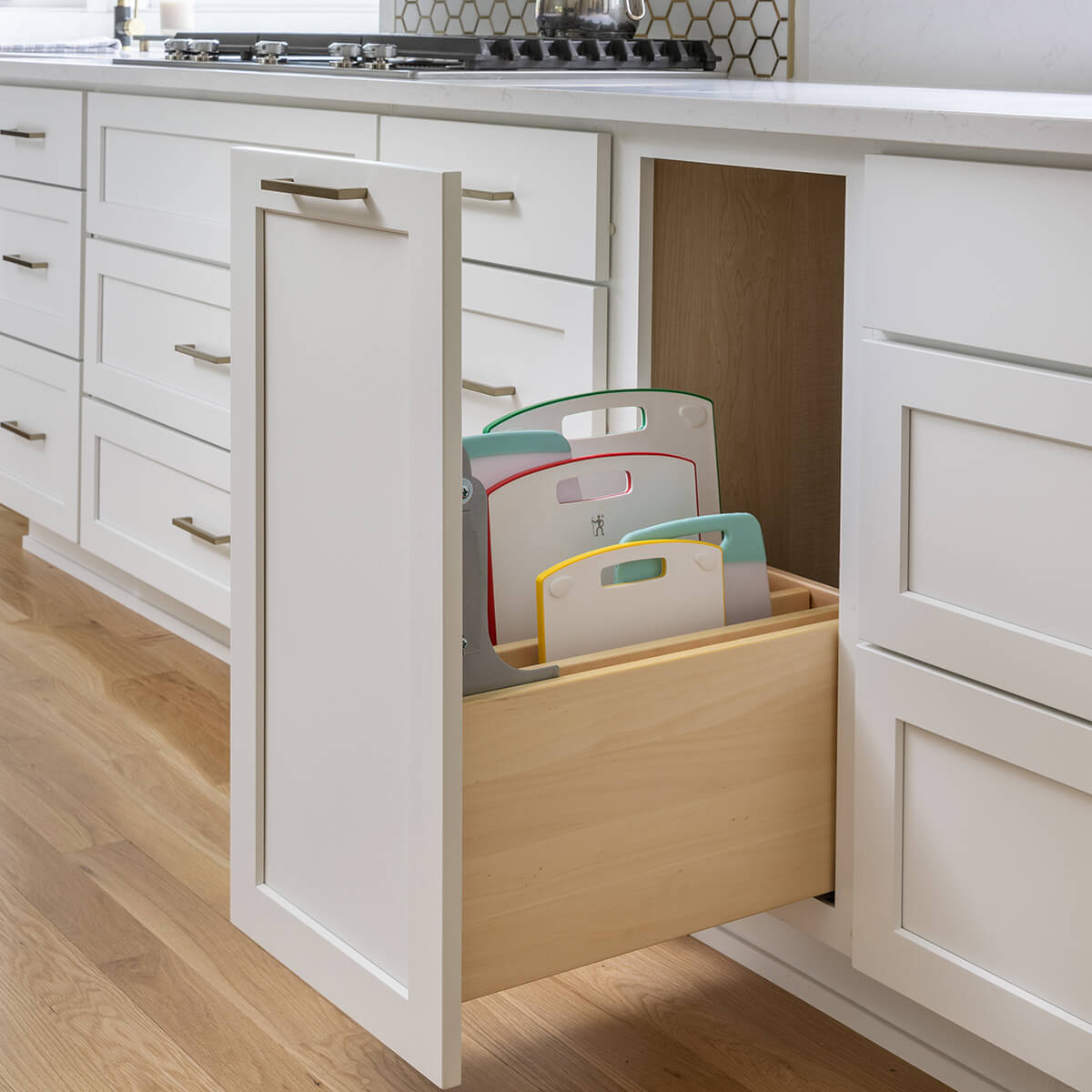 Pull-out tray storage base cabinet by Dura Supreme Cabinetry.