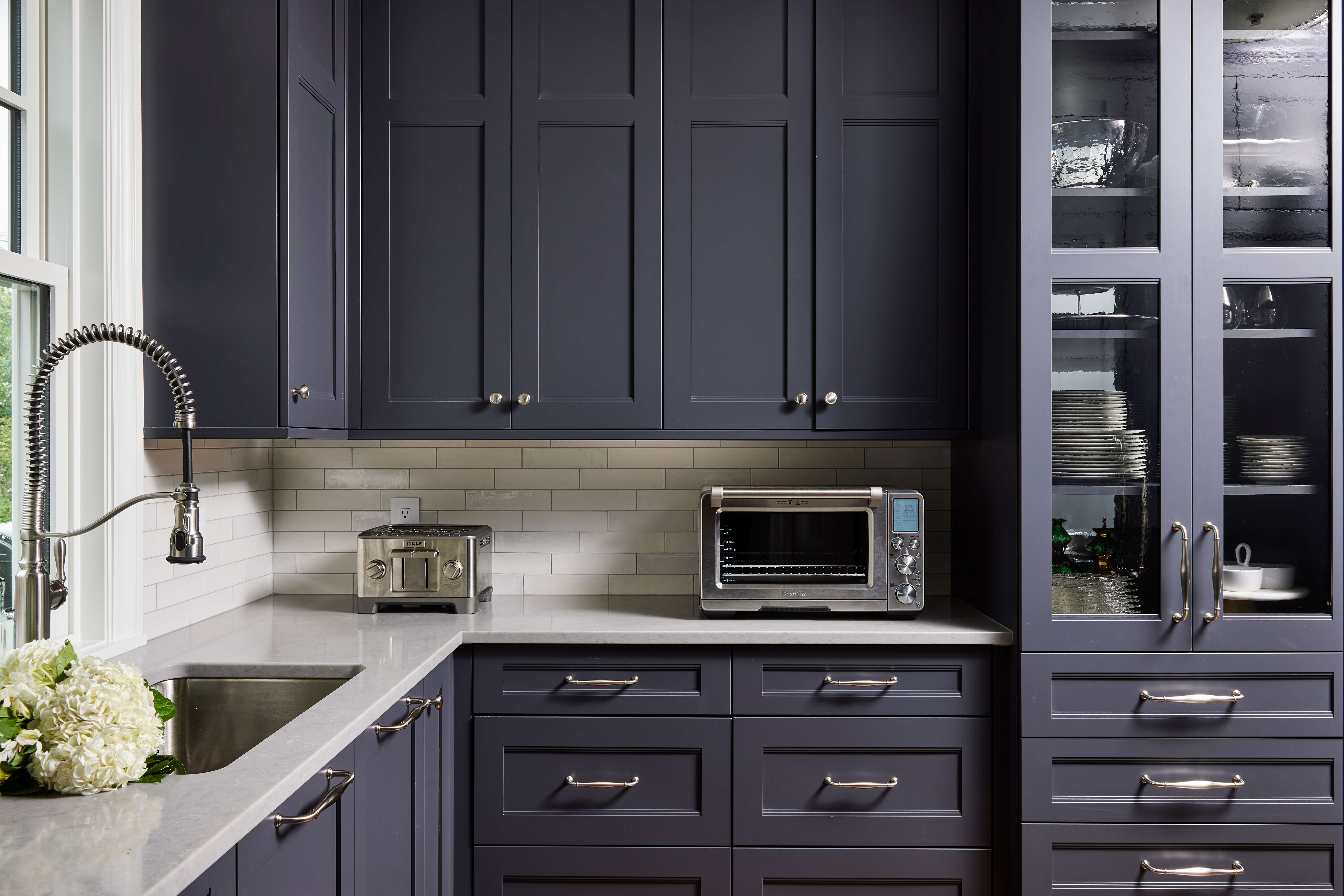 Dark Gray and Navy Blue kitchen cabinets that are almost black.