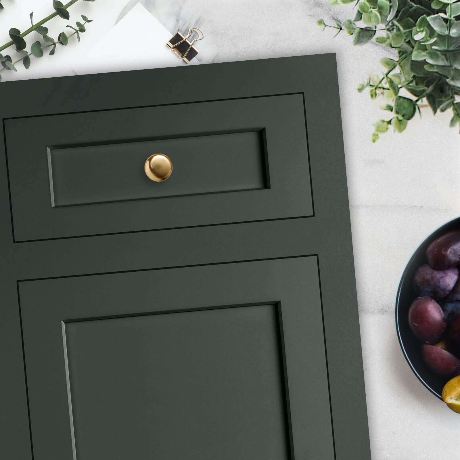 A dark green shaker styled inset door style.