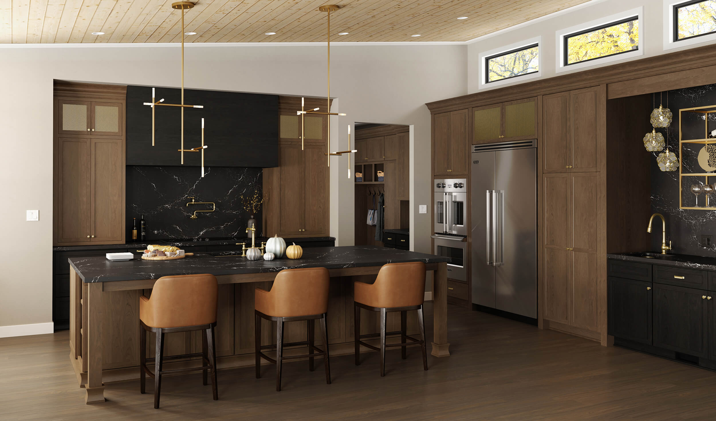 A modern kitchen with traditionally framed cabinets in a mix of brown stained wood and black stained wood.