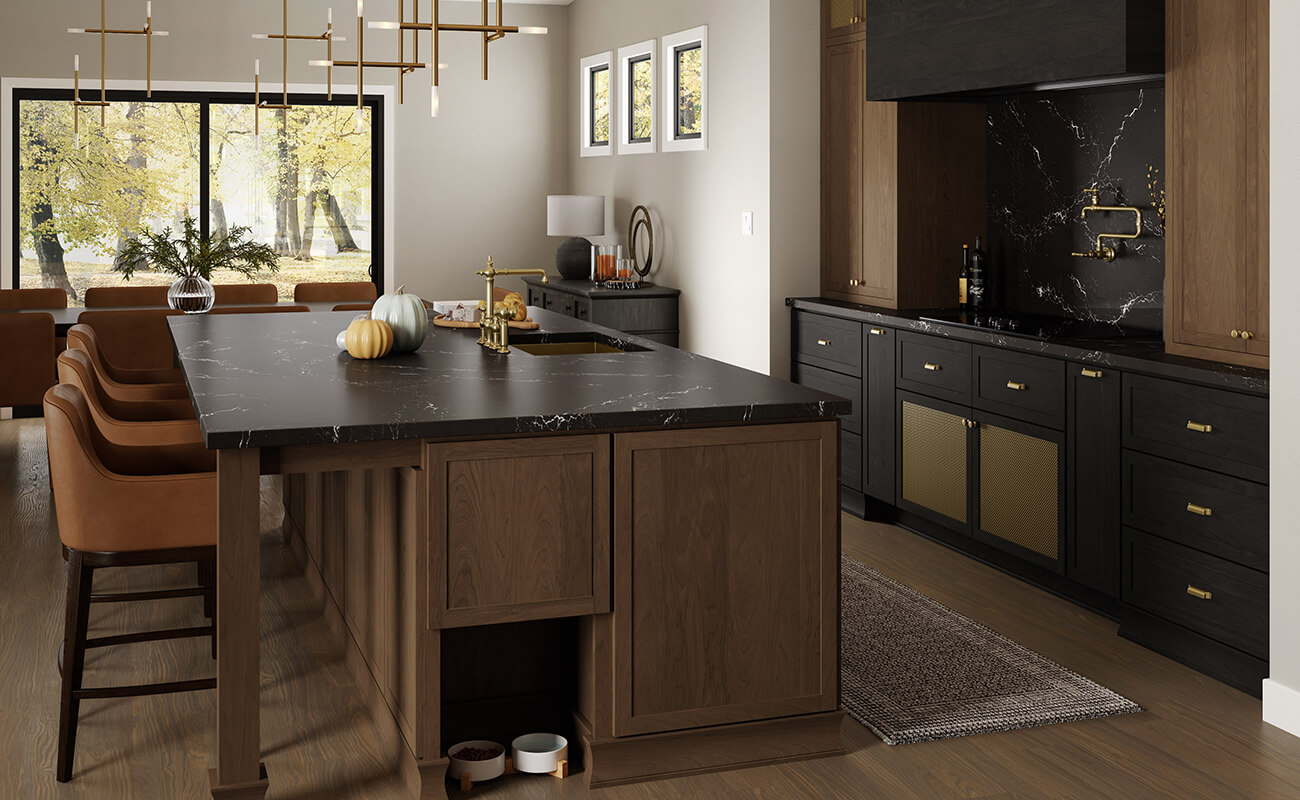 A warm and transitional kitchen design with a medium stain and a black stain for the cabinets.