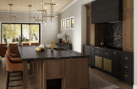 A dreamy kitchen with warm woods and black accents featuring a shallow, modern shaker door.
