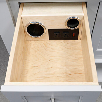 Showing the 2 cup/ 2 outlet option for a vanity grooming drawer from Dura Supreme Cabinetry.