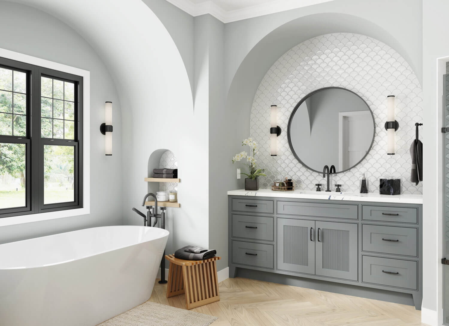 A classy bathroom design with reeded cabinet doors on the vanity and a free standing bath tub.