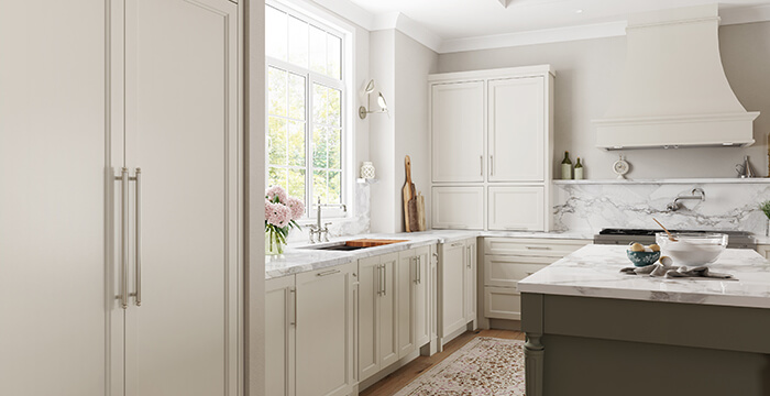 A gorgeous semi-custom and custom kitchen with American framed cabinets from Dura Supreme Cabinetry.