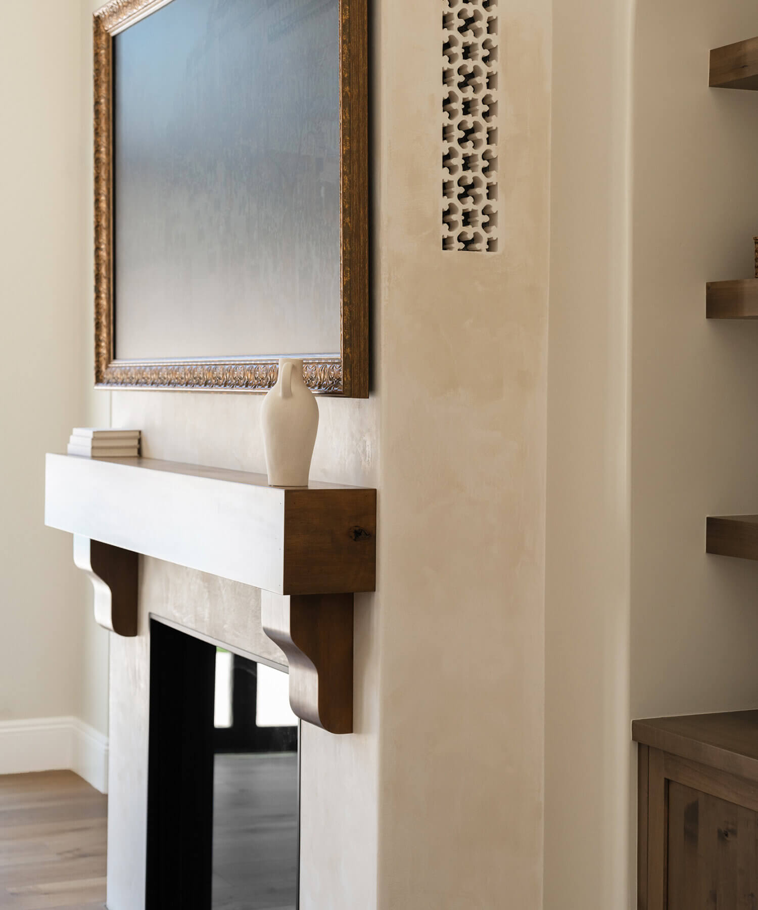 A minimalist Mediterranean style fireplace.