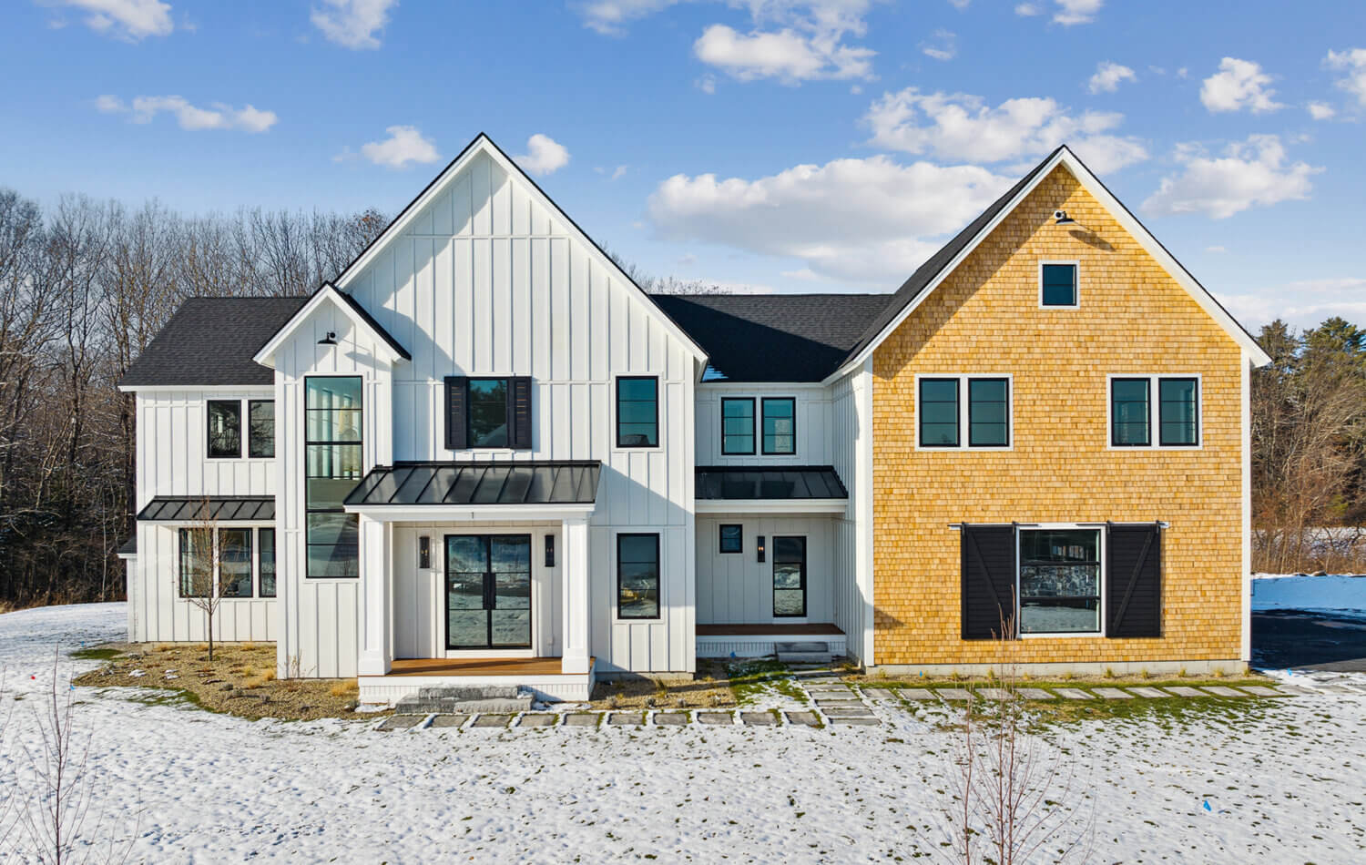 The exterior of the new construction modern farmhouse.