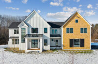 The exterior of the new construction modern farmhouse.
