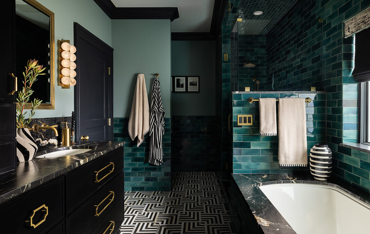 Black , teal, and gold moodiy bathroom desgin with a micro skinny shaker door style.