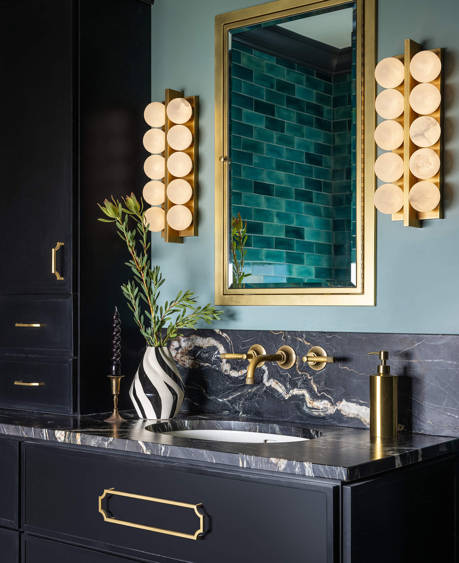 Black , teal, and gold moodiy bathroom desgin with a micro skinny shaker door style.