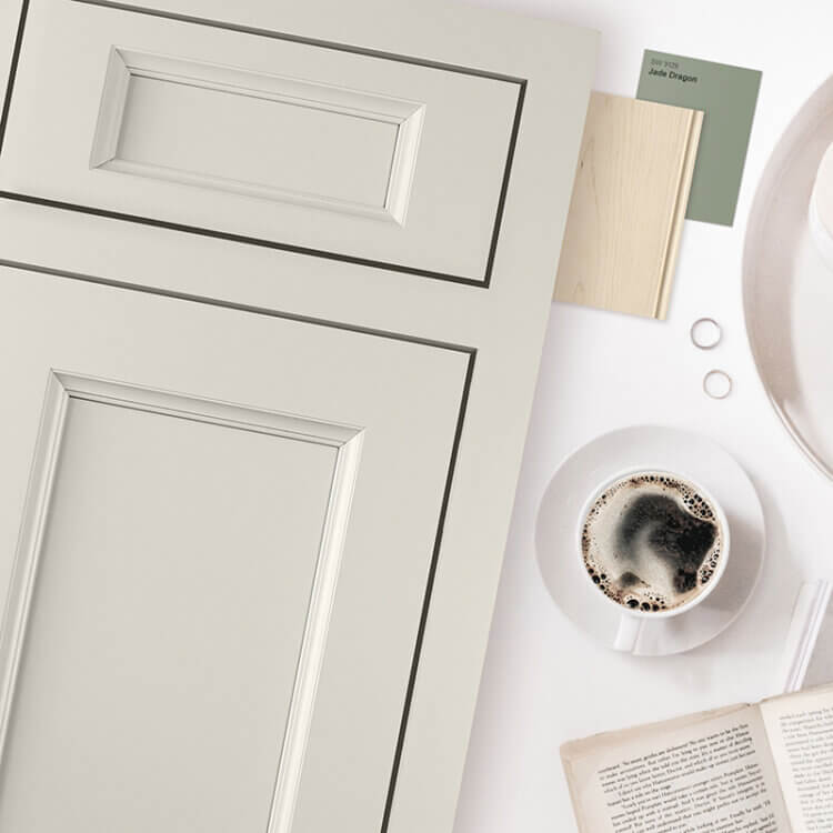 A kitchen design idea with a transitional styled inset cabinet door with a dramatic, deep center panel.