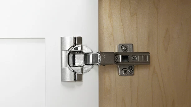 How to adjust an inset cabinet door hinge that is concealed.