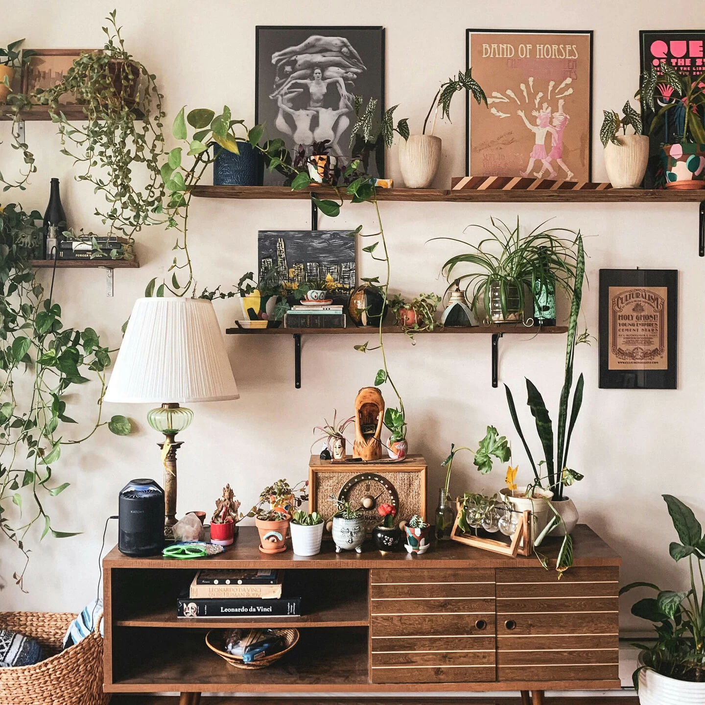 An example of a Luscious Biophilic with Mid-Century styled furniture & decor. 